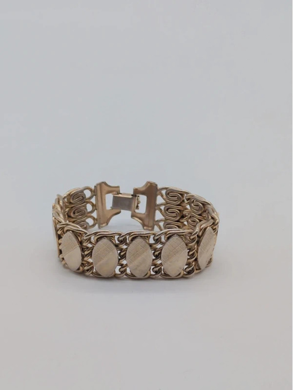 Gold Tone Textured Oval Panel Scroll Link Bracelet 7.25"